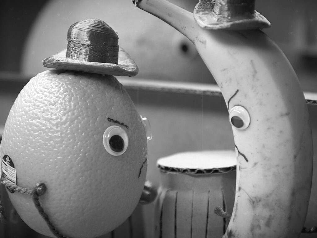 Banana Cassidy and the Sunkist Kid face off in front of a shocked Cantaloupe Dan.