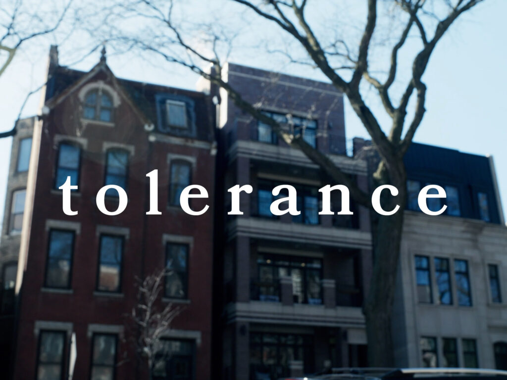 A title card reading "tolerance" overlaid on an image of a wealthy Chicago neighborhood street.